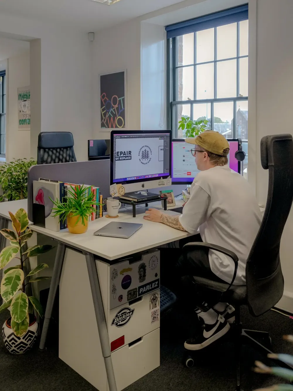 An image of Michael at his desk